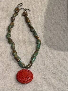 Source Unknown Turquoise-Green Bead Necklace with Red Carved Pendant